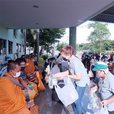 Make merit by offering rice and dry food to monks On the occasion of the 27th anniversary of its founding